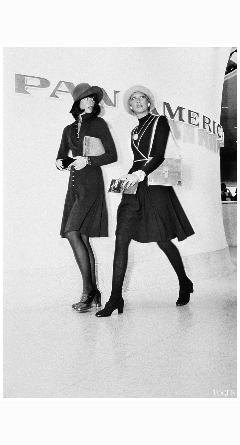 kourken-pakchanian-models-walking-in-front-of-a-pan-american-airlines-sign-at-left-wearing-a-wool-jersey-knit-wrap-dress-by-rodriguez-and-at-right-wearing-a-knit-dress-with-piping-an