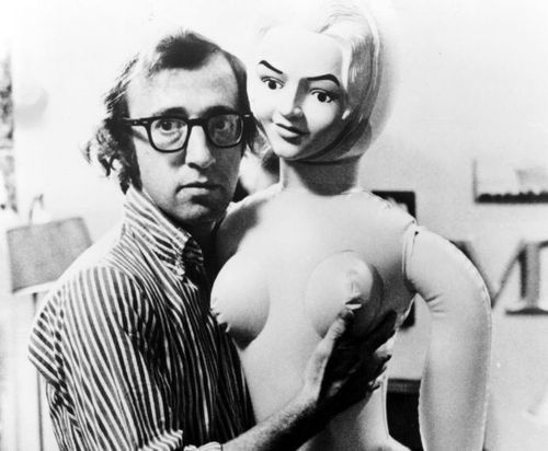 merican-director-and-actor-woody-allen-with-a-rubber-doll-usa-circa-1960